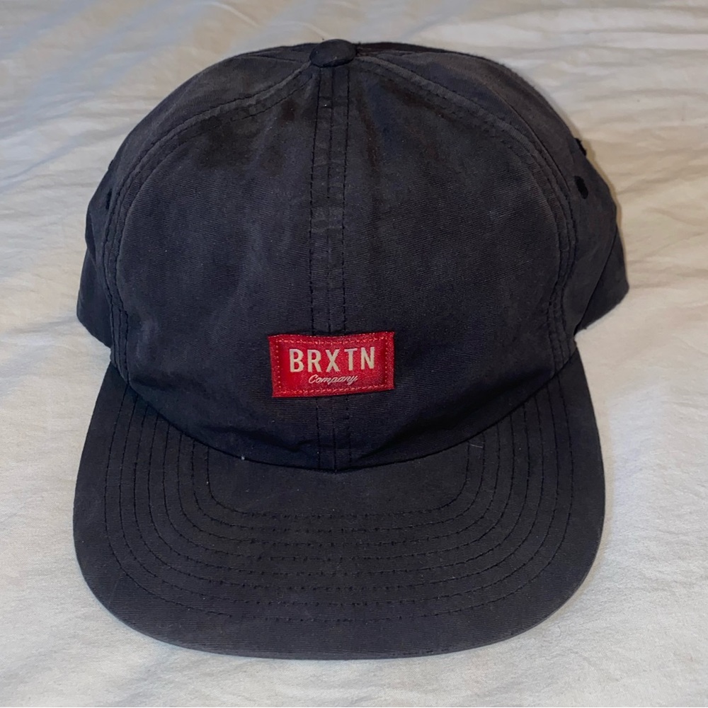 Brixton SnapBack/buckle hat. Slightly used. Great condition. Unique back of hat.